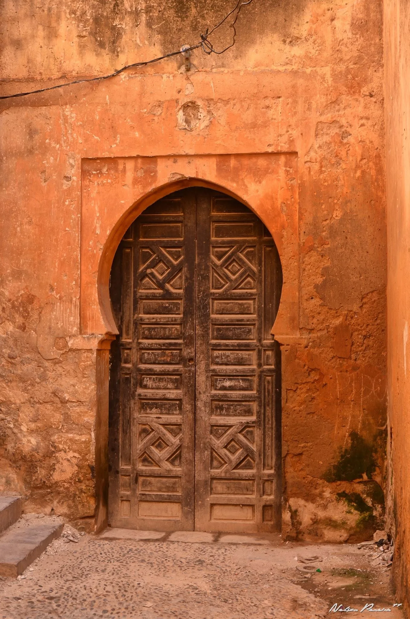 Carved wooden door in the Kasbah of the Udayas